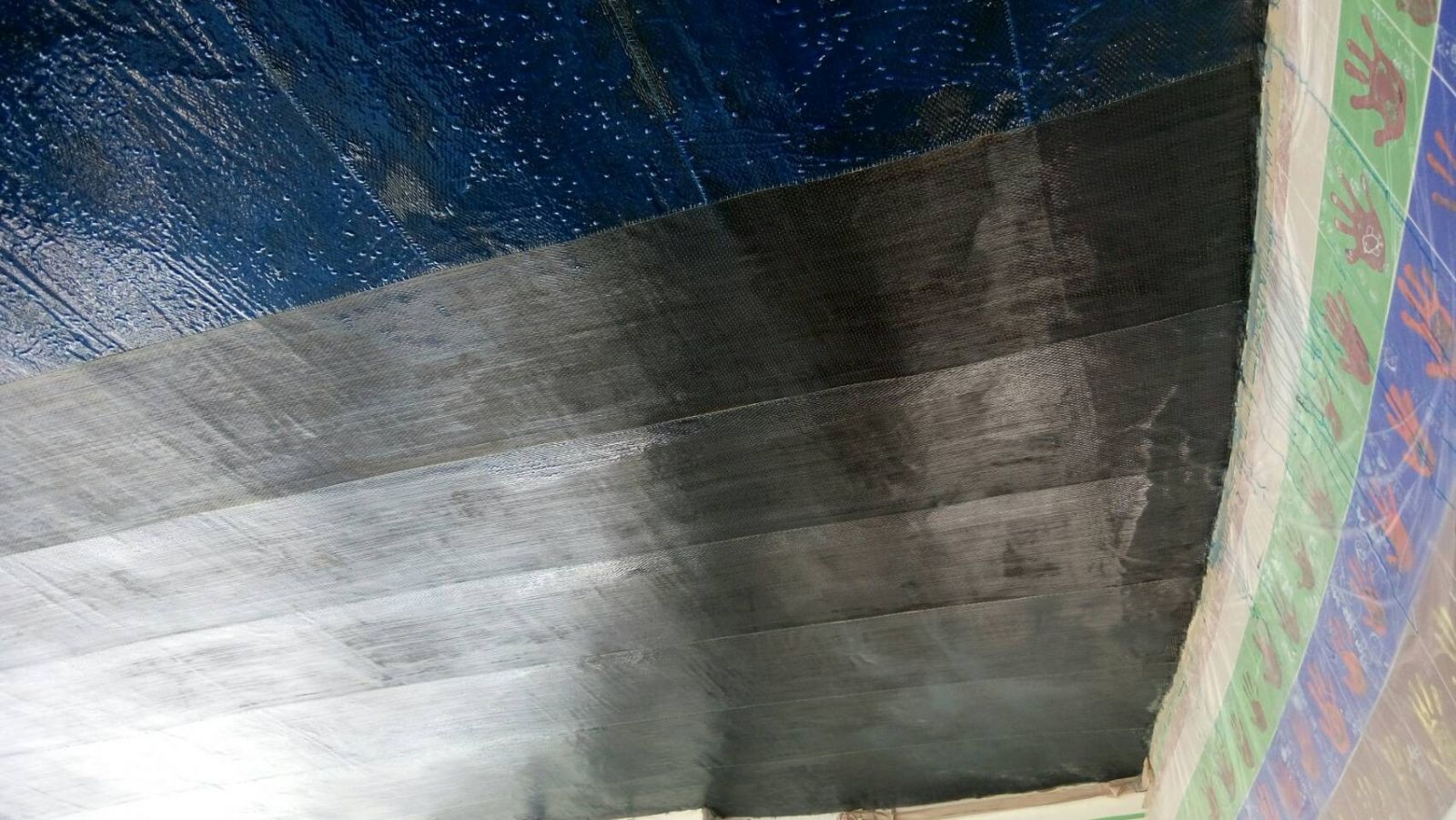 Epoxy面塗滾塗搭接及碳纖維貼附第2層長向
